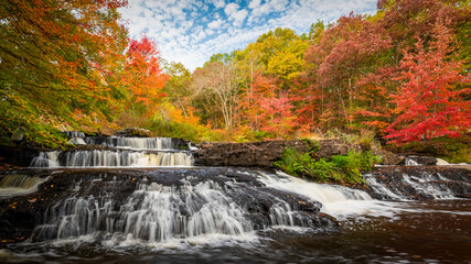 
Colorful autumn foliage surrounding the Shohola Falls in Pennsylvania