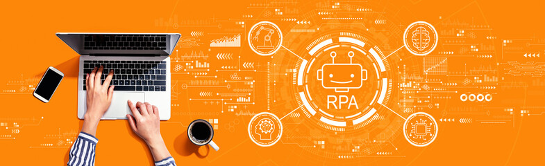 Robotic Process Automation RPA theme with person using a laptop computer