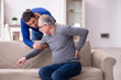 © Elnur - Young man looking after his sick father