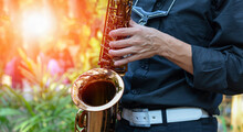 International Jazz Day And World Jazz Festival. Saxophone, Music Instrument Played By Saxophonist Player Musician In Fest.