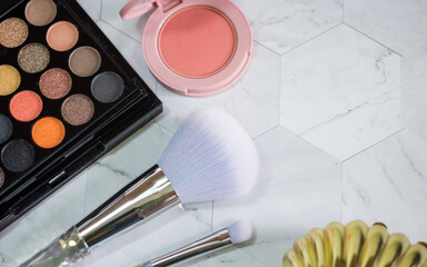 A multicolored set of shadows and blush. Cosmetics for girls and women.