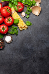 Canvas Print - Italian cuisine ingredients. Tomatoes, pasta, herbs and spices