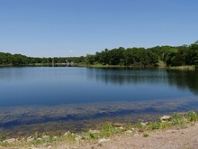 Semi Side View Of A Lake At Chickasaw National Recreation Area In Davis, Oklahoma
