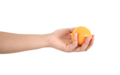 A hand holding an orange outstretched in front of a white background