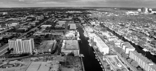 Wall Mural - Aerial view of Fort Lauderdale Canals and Cityscape on a sunny day from drone, slow motion.