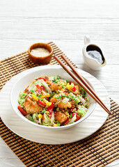 Wall Mural - sesame chicken with chinese cabbage, top view