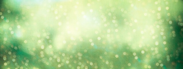 Wall Mural - green bokeh background with gold lights - festive christmas holidays - banner, panorama grunge textu