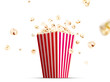 Flying popcorn from striped bucket
