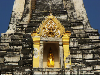 Ayutthaya, Thailand, January 24, 2013: Golden Buddha on the altar of a stupa in Ayutthaya, former capital of the kingdom of Siam. Thailand