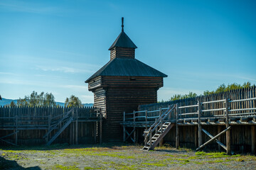 Wall Mural - Natural landscape with wooden buildings.