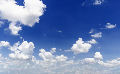 beautiful blue sky and white fluffy cloud horizon outdoor for background.