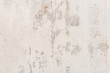white white background and texture of peeling paint on plaster wall because  old paint expired.