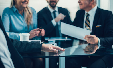 Wall Mural - close up. a group of business people discuss financial informat