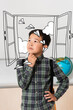 © LIGHTFIELD STUDIOS - Dreamy asian schoolboy looking away near window and paper planes illustration