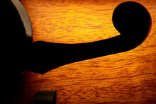 Close Up Of F Hole On Mandolin