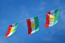 Iraqi Kurdish Flag, Three Side By Side In The Blue Sky