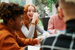 © IVAN GENER/Stocksy - Teens having fun playing cards