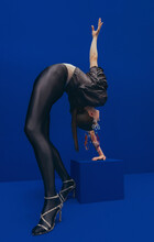 Fashion Gymnastic In Blue Abstract Space .