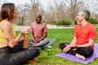 © IVAN GENER/Stocksy - Friends talking after yoga in a park
