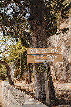 Wedding This Way Wooden Sign