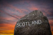 The Scottish Border Sign At Sunset