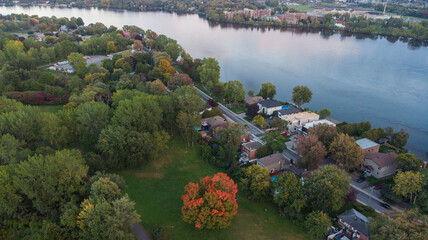 Wall Mural - Canadian autumn, aerial view of Laval city in Quebec