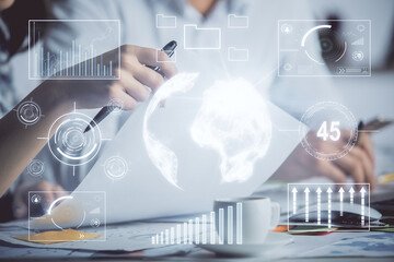 Double exposure of forex graph drawing over people taking notes background. Concept of financial analysis