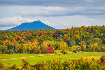 Wall Mural - view of rural farm fields and forests  with Camels Hump Mountain in fall foliage season, in Vermont
