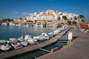 Peníscola harbor with the castle and the walled precinct in the background, Castellon, Spain