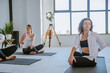 © lithiumphoto - Yoga class of young people group indoor