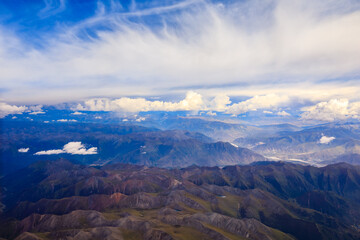 Aerial view of mountain and clouds scenery in Tibet,China.