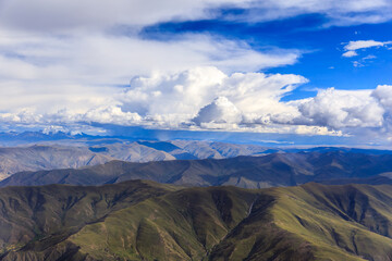 Aerial view of mountain and clouds scenery in Tibet,China.