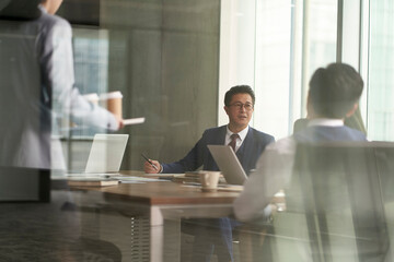 Wall Mural - asian corporate executives meeting in conference room