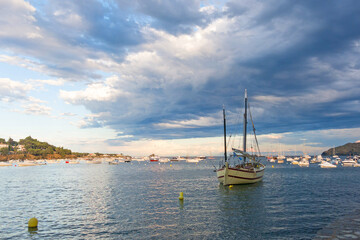 Wall Mural - Spectacular sunset in the small seaside town of Cadaqués. Cadaques, coastal village of the mediterranean sea - Catalonia, Girona, Spain