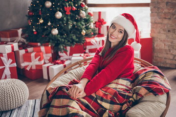 Sticker - Portrait of her she nice attractive pretty charming cheerful cheery girl wearing festal cap enjoying sitting in cosy chair festal day at modern loft industrial brick style house interior