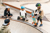 Smiling kids wearing safety gear