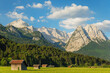 © robertharding - Hay barns at Hammersbach Footpath against Wetterstein Mountain Range, Garmisch-Partenkirchen, Werdenfelser Land, Upper Bavaria