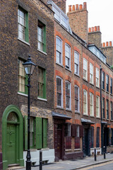 Wall Mural - Georgian terraced town house in Spitafields London once the home of a wealthy Huguenot silk merchant and is a popular travel destination tourist attraction landmark of England UK stock photo image