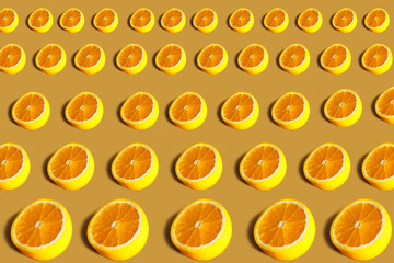 Wall Mural - Lemons pattern. Repeating round half of lemon on an orange background. Lots of lemon halves on an orange surface. Horizontal. The concept of healthy food and vegetarianism.