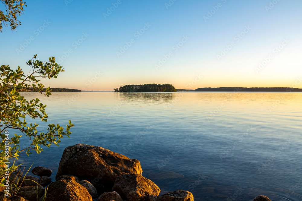 View of the sunset on The Lake Saimaa, Lammassaari, Imatra, Finland - obrazy, fototapety, plakaty 