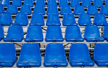 Stadium Seats Background. Rows Of Blue Plastic Empty Chairs