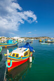 Fototapeta Lawenda - Traditional boats in Marsaxlokk, Malta