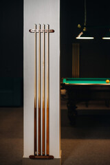 Billiard cue in the game club.Billiard club