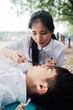 © Pansfun Images/Stocksy - Young Asian college couple