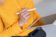 © Robijn Page/Westend61 - Close-up of businesswoman using digital tablet in office