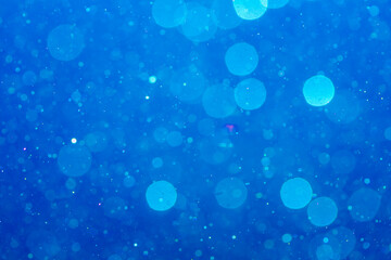 Wall Mural - Abstract Blue bokeh defocus by neon lights blur