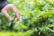© pandaclub23 - hand of man holding a cigarette