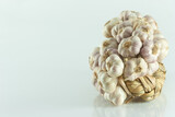 Fototapeta Kwiaty - Bundle of garlic isolated on white backgrond.
