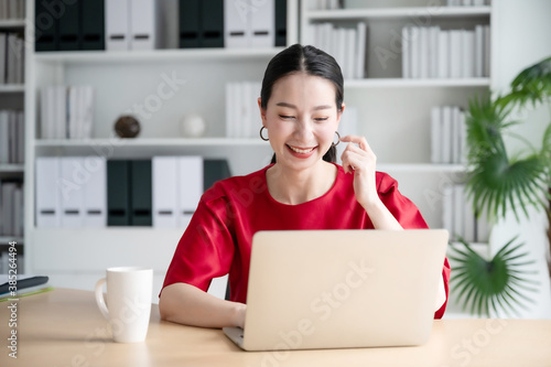 Cuadros en Lienzo Work from home concept, Portrait of beautiful young asian woman working on lapto