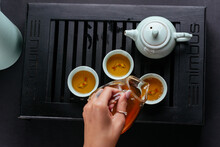 Chinese Tea Ceremony On A Black Background
